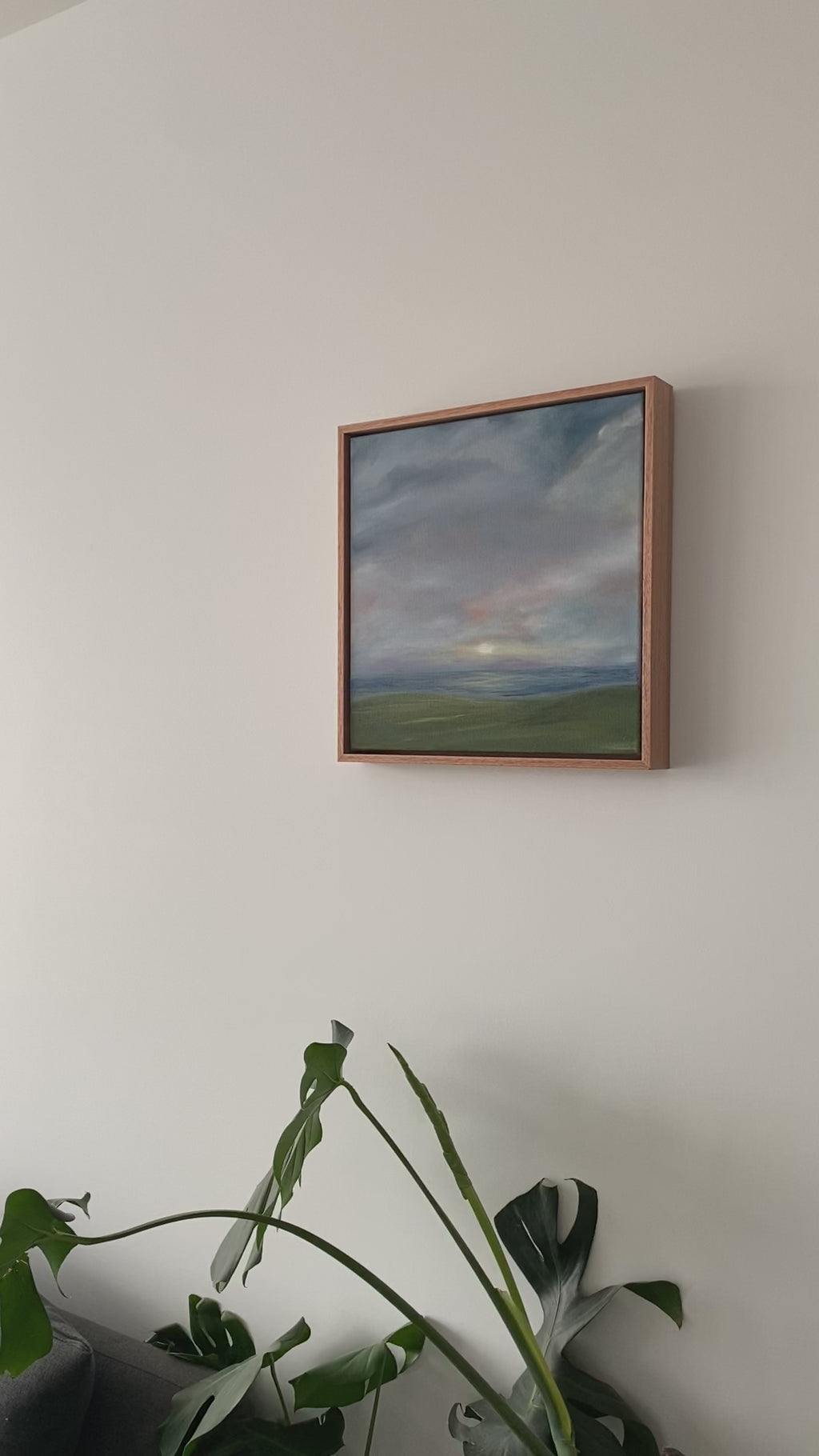 A video showing the wall art Here Comes the Sun on a white wall.